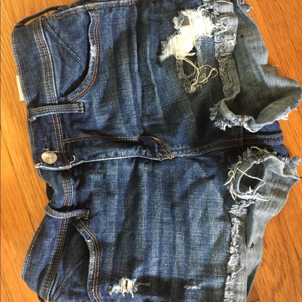 Medium wash ripped jean shorts